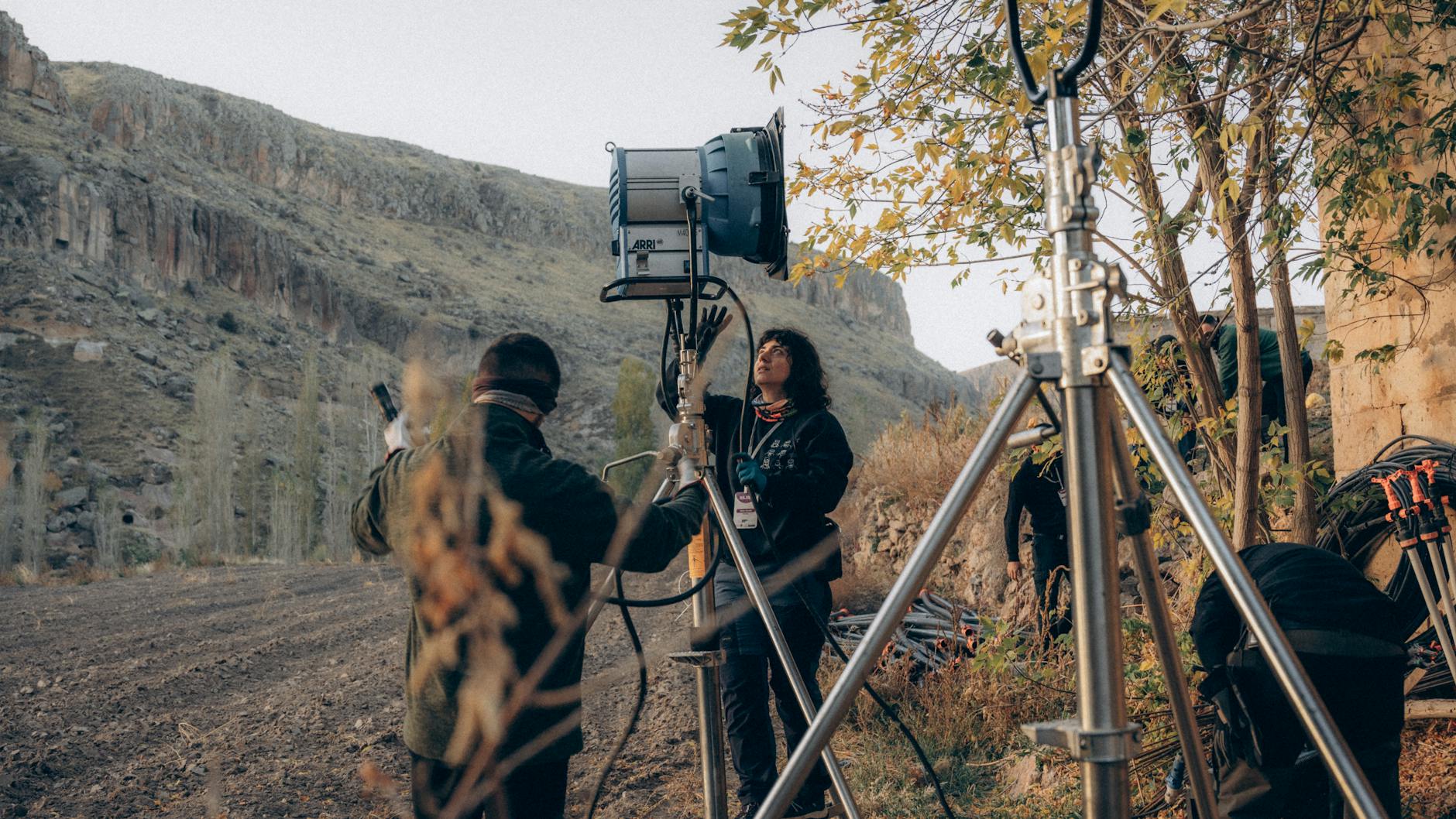 Film crew on set with JioHotstar logo